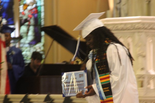 Students receive diplomas